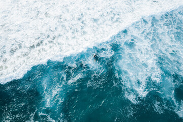 Wall Mural - aerial view of waves in ocean