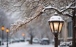 © sonderstock - Closeup street lamp in the snow, blurred city scene background