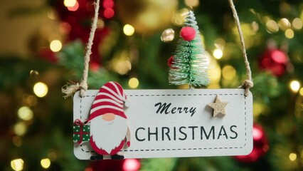 merry christmas patch hanging from a christmas tree