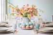 Beautifully decorated Easter dinner table with colorful flowers, pastel crockery and dyed eggs. Indoor Easter celebration party for small number of guests.