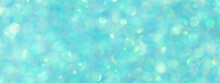 Blurred Shiny Turquoise Background With Sparkling Lights.