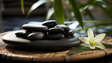 Fototapeta  - Gładkie kamienie do masażu tajskiego na bambusowej podstawce.