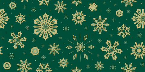 christmas seamless pattern with whimsical snowflakes. golden snowflake shapes on deep green backgrou