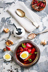 Sticker - Traditional Ukrainian Russian borscht . Bowl of red beet root soup borsch with boiled egg