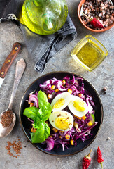 Canvas Print - Cabbage salad with corn and boiled egg.