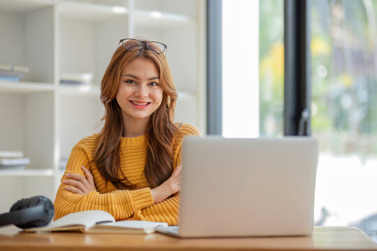 Asian girl student online learning class study online video call zoom teacher, Happy asian girl learn language online with computer laptop.