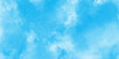 blue sky with clouds. Light sky-blue shades watercolor background Sky clouds with brush painted blue watercolor texture, Classic hand painted Blue watercolor background for design. 
