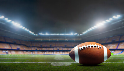 Poster - American football players on the field with closeup on ball and stadium lights. Sports background