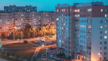 Wall Mural - Elevated View Cityscape Skyline. Street Background Backdrop Night Time Lapse. City Traffic And Highrise Houses. Time-lapse Evening Scenic View Of Highrise Houses. Night Light Lighting Timelapse.