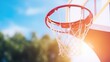 A basketball basket with a ball on a blue sky background. 