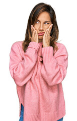 Poster - Young hispanic woman wearing casual clothes tired hands covering face, depression and sadness, upset and irritated for problem