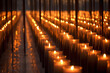Rows of memorial candles lit in remembrance - serving as a solemn tribute in a reflective and commemorative setting - symbolizing respect and memory.