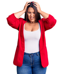 Sticker - Young beautiful brunette woman wearing elegant clothes suffering from headache desperate and stressed because pain and migraine. hands on head.