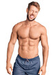 © Krakenimages.com - Young caucasian man standing shirtless winking looking at the camera with sexy expression, cheerful and happy face.