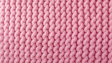 Texture Of Pink Knitted Fabric Closeup