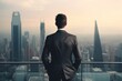 A professional man in a suit standing and gazing at the cityscape. Suitable for business, success, and urban themes