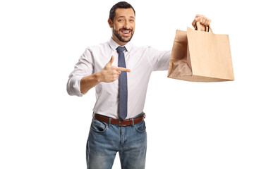 Wall Mural - Man pointing at a paper bag and smiling