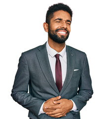 Poster - Young african american man wearing business clothes with hand on stomach because nausea, painful disease feeling unwell. ache concept.