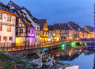 Wall Mural - Traditional half-timbered houses in old town of Colmar at Christmas time, Alsace, France