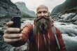 © Jorge Ferreiro - man with a thick, long beard taking a selfie