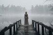 Ethereal scene of a woman standing at the end of a misty dock, gazing into a fog-shrouded lake, evoking mystery and contemplation.