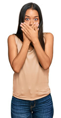 Poster - Beautiful hispanic woman wearing casual clothes shocked covering mouth with hands for mistake. secret concept.