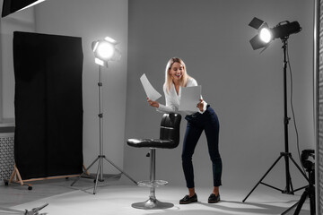 Poster - Casting call. Emotional woman performing against grey background in studio