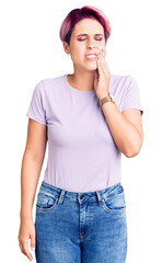 Sticker - Young beautiful woman with pink hair wearing casual clothes touching mouth with hand with painful expression because of toothache or dental illness on teeth. dentist