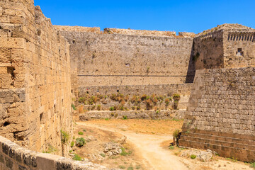 A huge moat around the ancient fortress. Background with selective focus and copy space