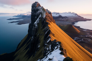 Wall Mural - A very long mountain with snow on it, aerial view