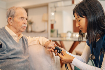 Checking to blood oxygen of an old man at home