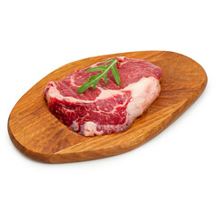 Fresh beef meat, ribeye steak, on a wooden board, on a white background, isolate