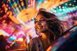 joyous girl smiling in a carnival with colorful cars
