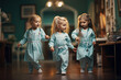 Little girls dressed in medical gowns and stethoscopes at school playing doctors