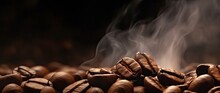 Coffee Bean Indulgence. Close Up View Of Dark Roasted Arabica Beans Creating Tasty And Aromatic Morning Beverage With Steam And Rich Flavor On Brown Background