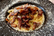 Classic  Pasta carbonara Italian with Bacon, eggs, Parmesan Cheese on black plate