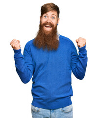 Poster - Young irish redhead man wearing casual clothes celebrating surprised and amazed for success with arms raised and open eyes. winner concept.