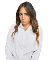 Wall Mural - Young brunette woman wearing casual clothes skeptic and nervous, frowning upset because of problem. negative person.