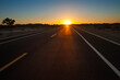 © Blue Jean Images - Road going through wilderness area at dusk in Inner Mongolia province, China