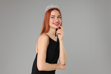 Poster - Beautiful young woman with tiara in dress on light grey background, space for text