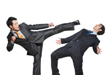 Two businessmen fighting on white background