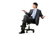 © Blue Jean Images - Young Businessman sitting on chair