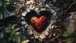 A broken heart on a cracked earth surface as symbol for sadness, lovesickness and lost love