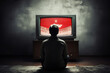 © Davivd - Lonely individual exposed to extremist propaganda - watching brainwashing content on TV - highlighting the danger of radicalization.
