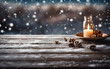 Closeup on a winter table, with snowy plank with snowfall in the cold sky