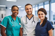 © VisualProduction - Doctors and nurses standing side by side and looking at the camera. Young female doctor is in the front wearing stethoscope and uniform.
