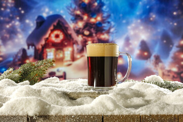 Wall Mural - Fresh cold beer in glass and snow decoration. Background of table cover of frost and snow. Chrismtas time in mountains. Cold december time. 