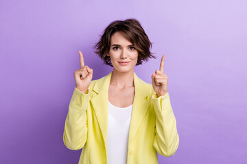 Photo of young lady brown bob hair wear stylish jacket indicate fingers up promoting relevant search isolated on violet color background