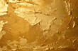 A close up of a gold paint texture