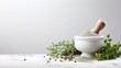 a mortar and pestle with various herbs and spices on a marble countertop.